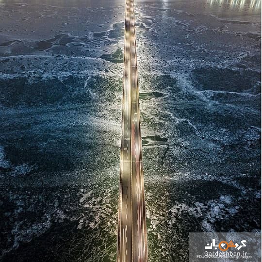 تصویری جالب از پلی بر روی رودخانه یخ زده
